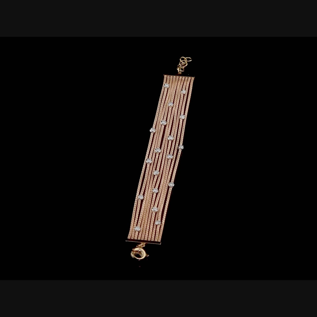 Görkemli on sıra altın halat formu ve parlak pırlanta detaylarıyla tasarlanmış, 18 ayar rose, sarı ve beyaz altın varyasyonlu pırlantalı altın halat bilezik modeli